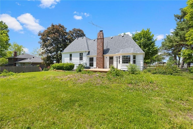 9501 Glenwood St, Overland Park, KS 66212 - rear view of property with a chimney