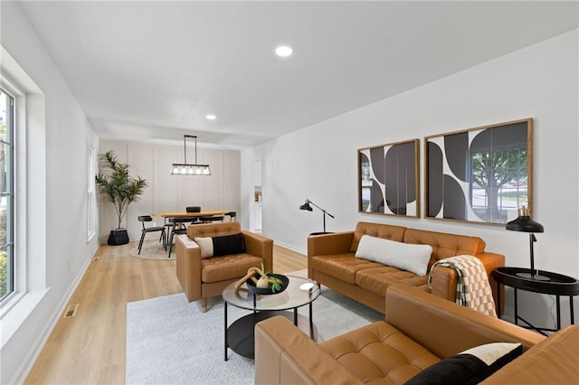 9501 Glenwood St, Overland Park, KS 66212 - living area featuring light wood-type flooring, plenty of natural light, recessed lighting, and baseboards