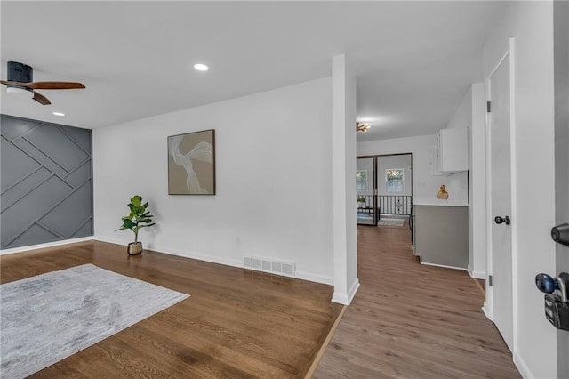 5005 S Grand Ave, Independence, MO 64055 - entrance foyer featuring a ceiling fan, wood finished floors, baseboards, and recessed lighting