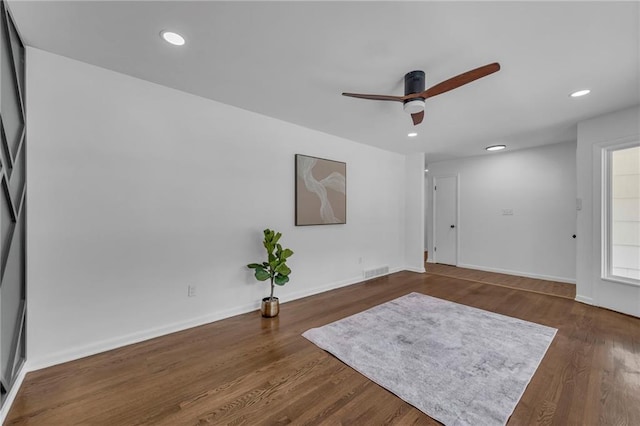 5005 S Grand Ave, Independence, MO 64055 - foyer entrance with a ceiling fan, dark wood-style flooring, recessed lighting, and baseboards