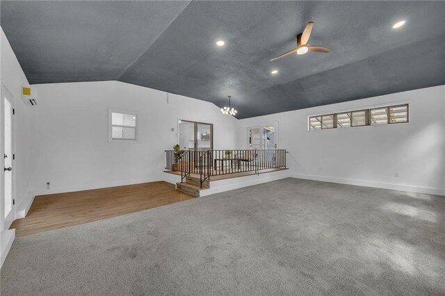 5005 S Grand Ave, Independence, MO 64055 - carpeted spare room featuring lofted ceiling, recessed lighting, ceiling fan, a chandelier, and baseboards