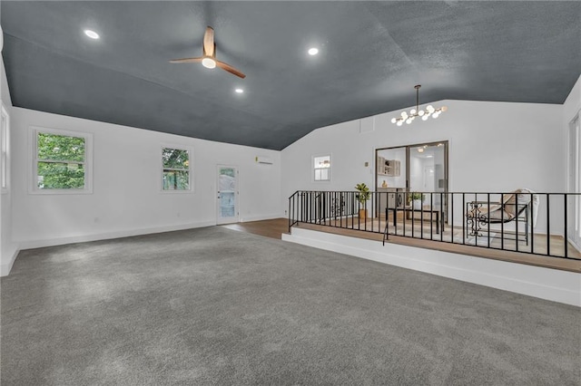 5005 S Grand Ave, Independence, MO 64055 - spare room featuring lofted ceiling, a ceiling fan, carpet floors, a chandelier, and baseboards