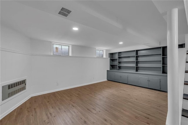 5005 S Grand Ave, Independence, MO 64055 - unfurnished room with wood finished floors, recessed lighting, and baseboards