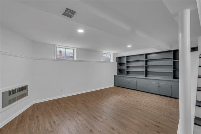5005 S Grand Ave, Independence, MO 64055 - basement featuring wood finished floors and recessed lighting