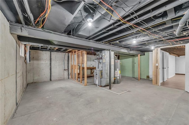 5005 S Grand Ave, Independence, MO 64055 - unfinished below grade area with gas water heater and heating unit