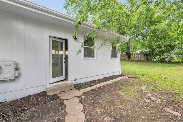 5005 S Grand Ave, Independence, MO 64055 - property entrance with a cooling unit