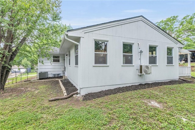 5005 S Grand Ave, Independence, MO 64055 - view of home's exterior with ac unit and central air condition unit