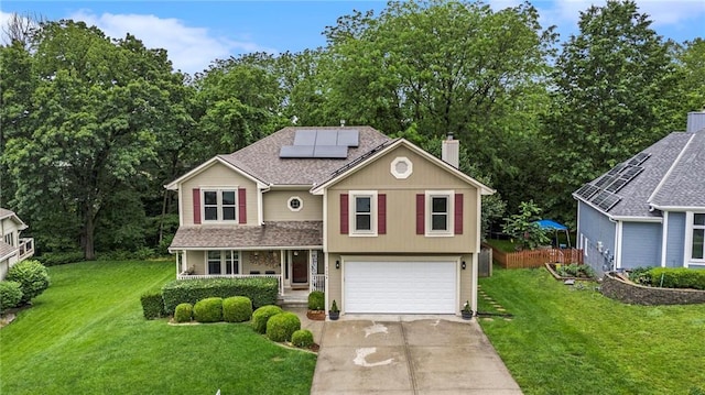 7504 N Palmer Ave, Kansas City, MO 64158 - traditional-style home featuring an attached garage, driveway, roof mounted solar panels, a porch, and a chimney