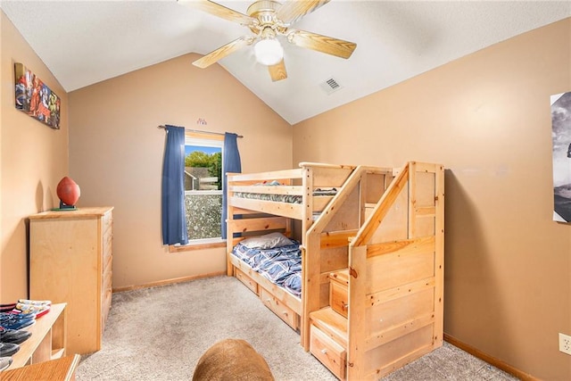 7504 N Palmer Ave, Kansas City, MO 64158 - carpeted bedroom featuring vaulted ceiling, baseboards, and ceiling fan