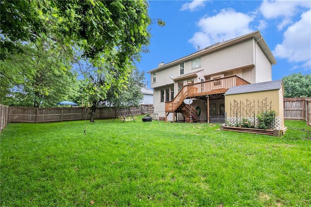 7504 N Palmer Ave, Kansas City, MO 64158 - back of house with stairs and a deck
