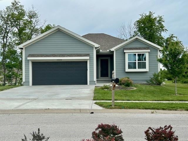 10204 Siena Dr, Peculiar, MO 64078 - ranch-style house with driveway, an attached garage, and a front lawn
