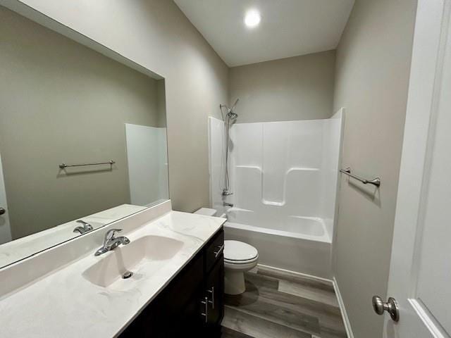 10204 Siena Dr, Peculiar, MO 64078 - full bath featuring toilet, vanity, wood finished floors, and shower / washtub combination