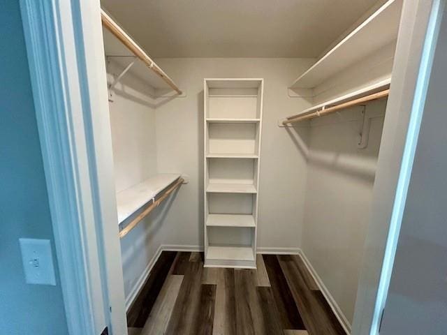 10204 Siena Dr, Peculiar, MO 64078 - walk in closet featuring dark wood-style floors