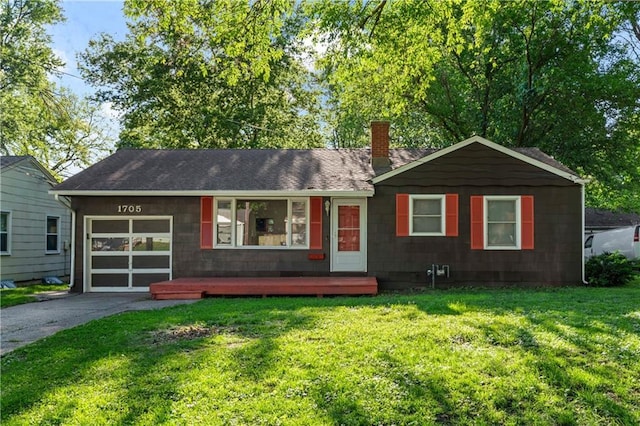 1705 S Pearl St, Independence, MO 64055 - ranch-style home with a chimney, an attached garage, asphalt driveway, a front lawn, and a shingled roof
