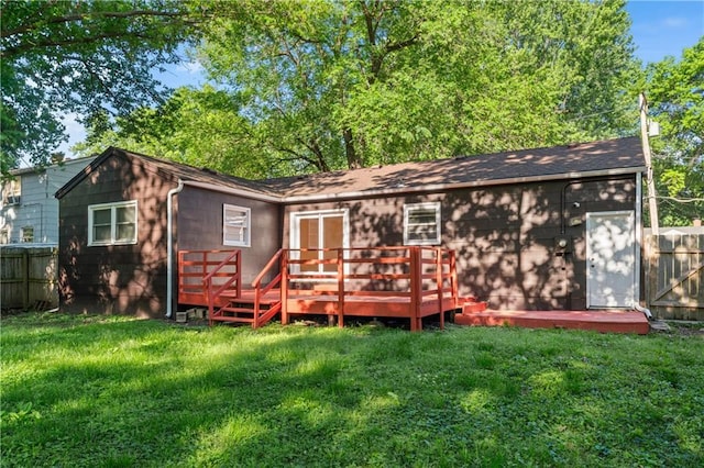 1705 S Pearl St, Independence, MO 64055 - rear view of property with a wooden deck