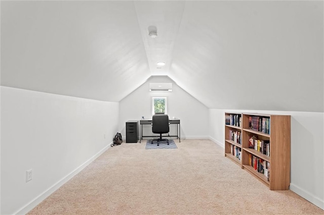 611 E 64th Ter, Kansas City, MO 64131 - carpeted office space with an AC wall unit and vaulted ceiling