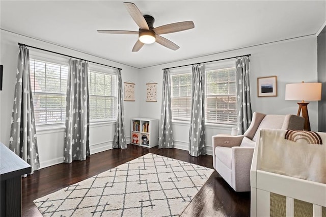 611 E 64th Ter, Kansas City, MO 64131 - sitting room featuring wood finished floors and ceiling fan