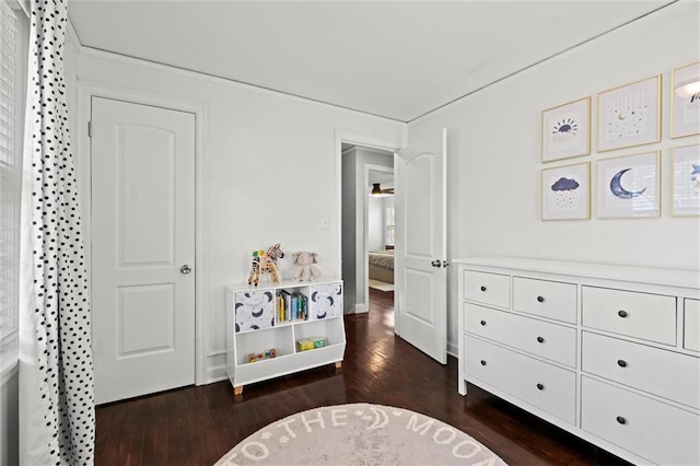 611 E 64th Ter, Kansas City, MO 64131 - bedroom featuring dark wood-style flooring