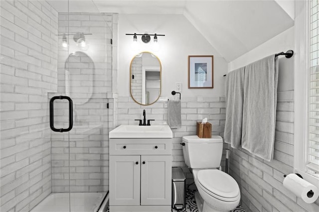 611 E 64th Ter, Kansas City, MO 64131 - full bathroom with a shower stall, vanity, tile walls, and vaulted ceiling