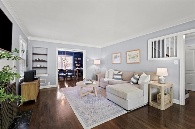 611 E 64th Ter, Kansas City, MO 64131 - living room with dark wood-style flooring and ornamental molding