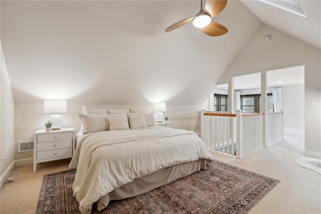 6661 Locust St, Kansas City, MO 64131 - bedroom with light colored carpet, ceiling fan, baseboards, and high vaulted ceiling