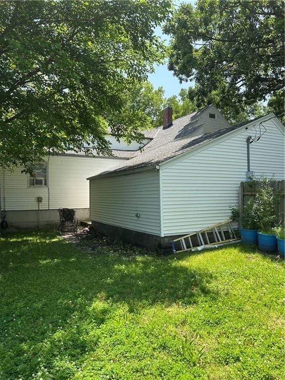 217 S 5th St, Burlington, KS 66839 - view of side of home with a chimney