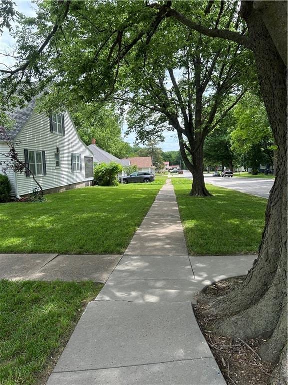 217 S 5th St, Burlington, KS 66839 - view of home's community featuring a yard