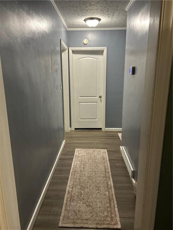 217 S 5th St, Burlington, KS 66839 - hallway featuring crown molding and dark wood finished floors