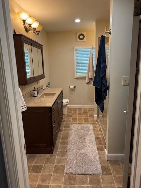 217 S 5th St, Burlington, KS 66839 - bathroom with vanity, tile patterned floors, and recessed lighting
