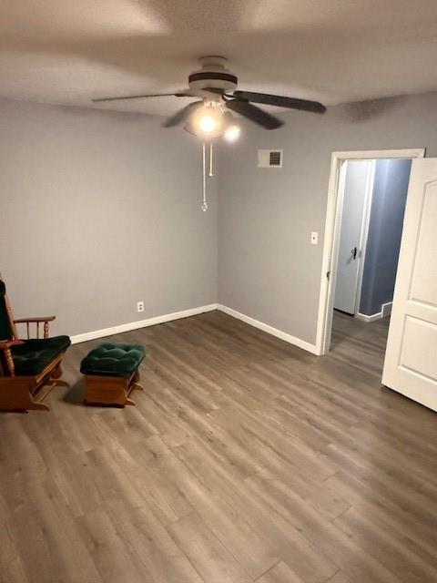 217 S 5th St, Burlington, KS 66839 - unfurnished room with a ceiling fan and wood finished floors