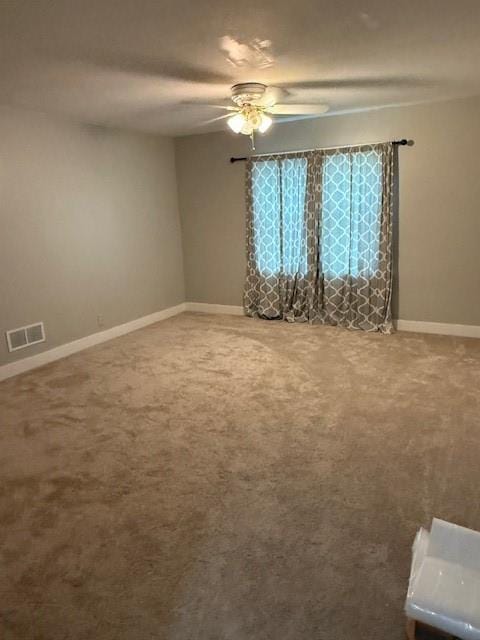 217 S 5th St, Burlington, KS 66839 - carpeted empty room with ceiling fan and baseboards