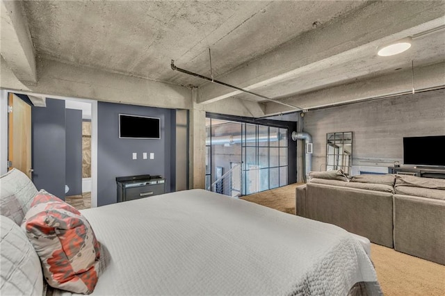 360 W Pershing Rd Unit 310, Kansas City, MO 64108 - carpeted bedroom featuring access to exterior