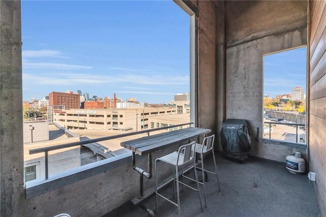 360 W Pershing Rd Unit 310, Kansas City, MO 64108 - balcony featuring a city view and area for grilling