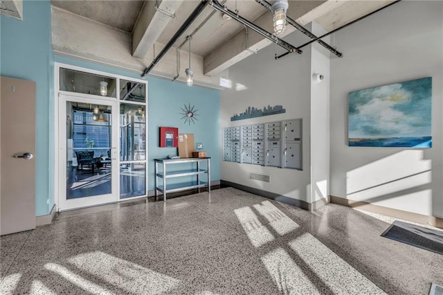 360 W Pershing Rd Unit 310, Kansas City, MO 64108 - common area featuring a high ceiling
