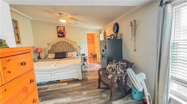 69 Porcupine Path, Linn Valley, KS 66040 - bedroom with ornamental molding, wood finished floors, vaulted ceiling, and ceiling fan