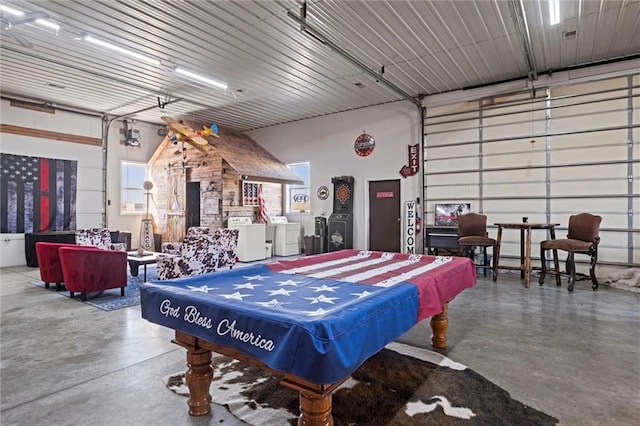 14971 Fairmount Rd, Basehor, KS 66007 - rec room featuring concrete floors, washer and dryer, and a garage