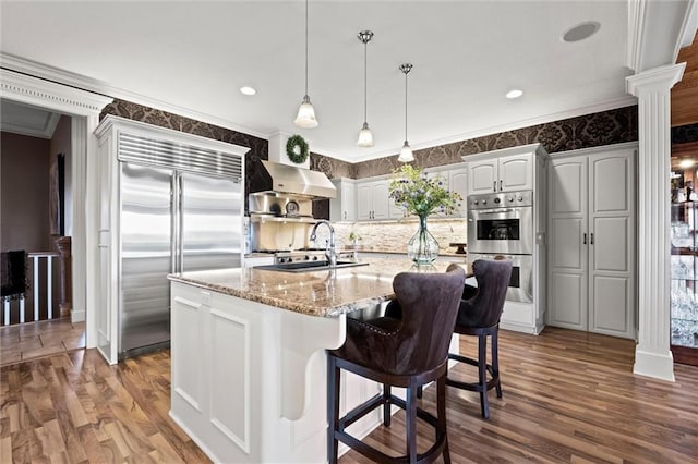 14971 Fairmount Rd, Basehor, KS 66007 - kitchen featuring stainless steel appliances, a sink, ornamental molding, dark wood-style flooring, and backsplash