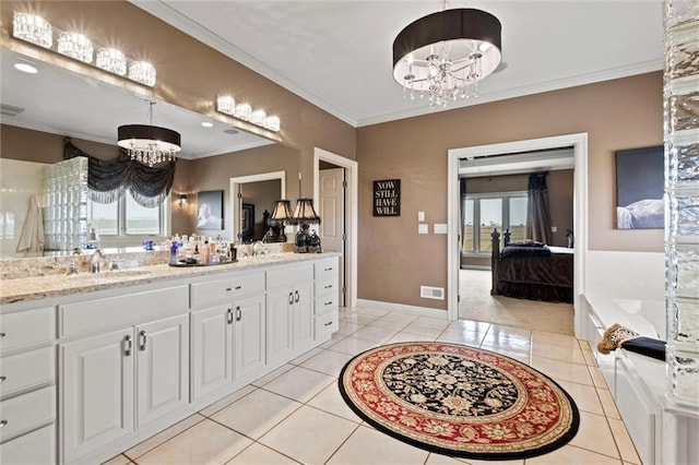 14971 Fairmount Rd, Basehor, KS 66007 - full bath with a chandelier, tile patterned floors, crown molding, double vanity, and a bath
