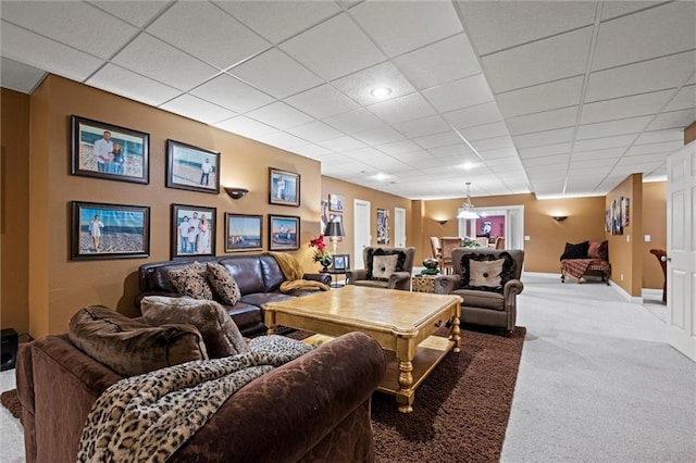 14971 Fairmount Rd, Basehor, KS 66007 - carpeted living area featuring a drop ceiling and baseboards