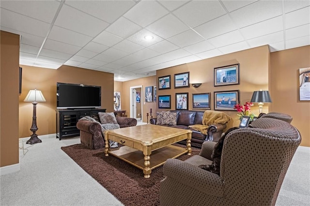 14971 Fairmount Rd, Basehor, KS 66007 - living area with carpet flooring, baseboards, and a drop ceiling