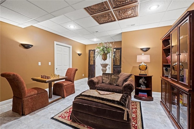 14971 Fairmount Rd, Basehor, KS 66007 - living area with baseboards and a drop ceiling