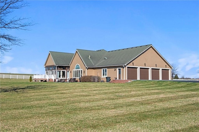 14971 Fairmount Rd, Basehor, KS 66007 - view of front of property with a garage and stucco siding