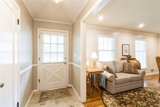 9613 Dearborn St, Overland Park, KS 66207 - doorway with light wood-style floors and crown molding
