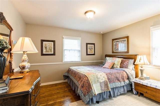 9613 Dearborn St, Overland Park, KS 66207 - bedroom with wood finished floors and baseboards