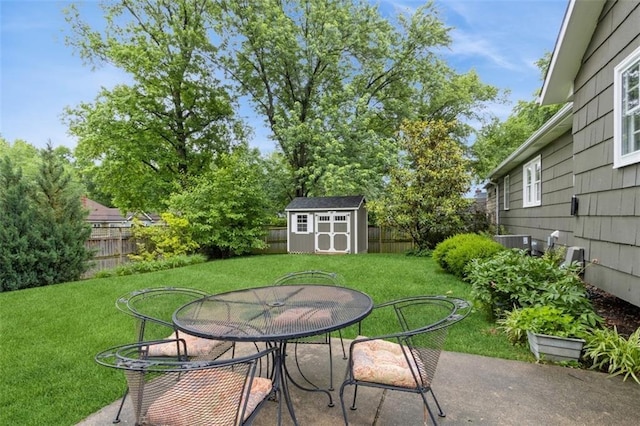 9613 Dearborn St, Overland Park, KS 66207 - view of patio / terrace featuring outdoor dining area and central air condition unit