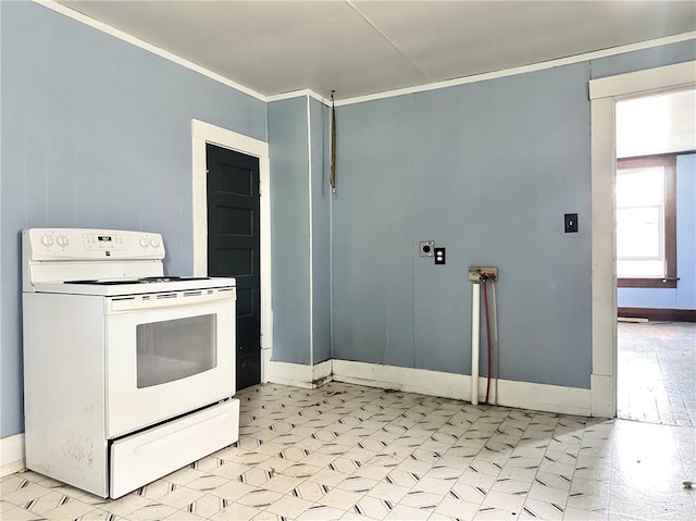 206 S Main St, Trenton, MO 64683 - kitchen with white electric stove, ornamental molding, and baseboards