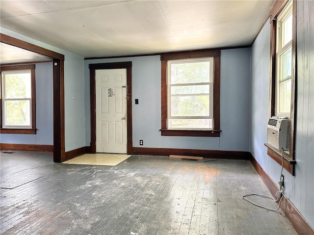 206 S Main St, Trenton, MO 64683 - entrance foyer with hardwood / wood-style floors, baseboards, and cooling unit
