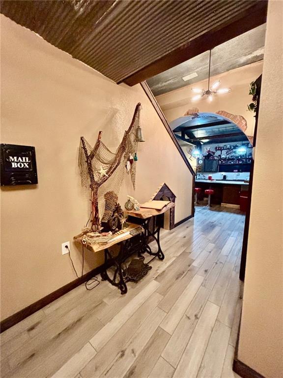 115 N 3rd St, Burlington, KS 66839 - hallway with wood finished floors and baseboards