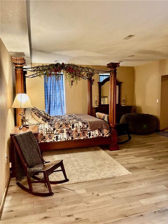 115 N 3rd St, Burlington, KS 66839 - bedroom featuring wood finished floors