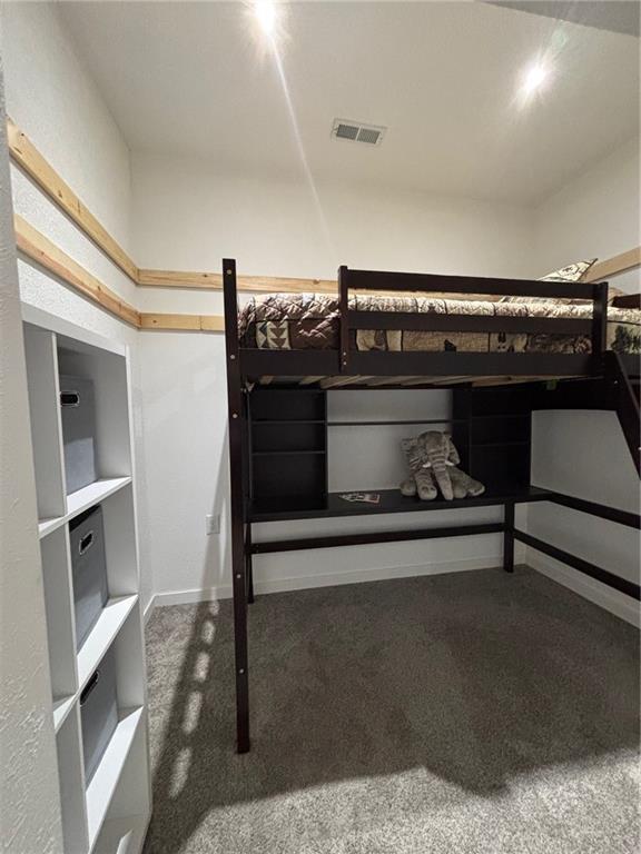 115 N 3rd St, Burlington, KS 66839 - bedroom with carpet flooring and baseboards
